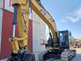 2015 Caterpillar 329ELN crawler excavator, front three-quarter view