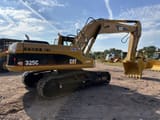 2018 Caterpillar 325C crawler excavator, rear three-quarter view