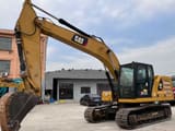Caterpillar 320GC crawler excavator, side profile view