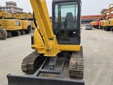 2022 Komatsu PC56-7 mini excavator, front view
