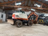 2007 Terex TW 110 wheel excavator rear three-quarter view