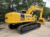 2022 Komatsu PC220-7 crawler excavator, rear three-quarter view