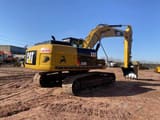 2019 Caterpillar 325D crawler excavator, rear three-quarter view