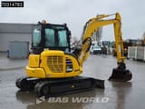 2024 Komatsu PC55MR-5 mini excavator, rear three-quarter view