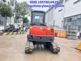 2023 Kubota KX057-4 mini excavator, rear view