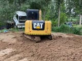 2024 Caterpillar 306E2 mini excavator, rear view