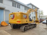 Caterpillar 320GC crawler excavator, rear three-quarter view
