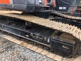 Hitachi ZX200-3 crawler excavator undercarriage detail