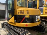 2021 Caterpillar 308C mini excavator, rear three-quarter view