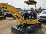 2023 Komatsu PC30 mini excavator, rear three-quarter view