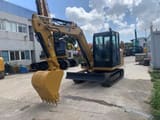 2022 Caterpillar 305E2 mini excavator, front three-quarter view