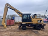 2012 Caterpillar M322D MH material handler, side profile view