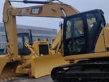2021 Caterpillar 320 excavator side view