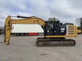 2012 Caterpillar 320E crawler excavator, side view