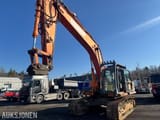 2010 Doosan DX300LC crawler excavator, front three-quarter view