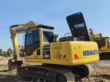 2023 Komatsu PC200 crawler excavator, rear three-quarter view