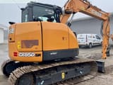 2023 CASE CX85D SR mini excavator, rear three-quarter view