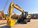 2006 Caterpillar M322C wheel excavator, front three-quarter view