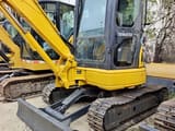 2023 Komatsu PC35MR-2 mini excavator, front three-quarter view