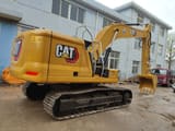 Caterpillar 320GC crawler excavator, rear three-quarter view