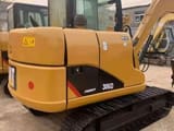 2023 Caterpillar 306D mini excavator, rear three-quarter view