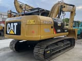2023 Caterpillar 320D2 L rupsgraafmachine, achteraanzicht driekwart