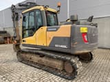 2013 Volvo EC140DL crawler excavator, rear three-quarter view