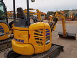 2022 Komatsu PC24MR-5 mini excavator, rear three-quarter view