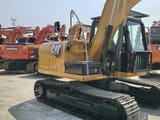2022 Caterpillar 312D2 crawler excavator, rear three-quarter view