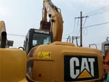 2018 Caterpillar 312D crawler excavator, rear three-quarter view
