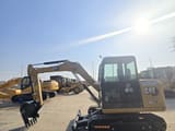 2024 Caterpillar 305.5 mini excavator, side view