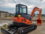Hitachi Zaxis 50U mini excavator, rear three-quarter view