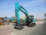 2024 Sunward SWE225E-3H Excavator with its teal boom and arm extended forward, showing the bucket.
