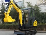 2026 Rippa R330 Mini Excavator with its yellow boom and bucket extended forward, showing the R330 model marking on the boom.