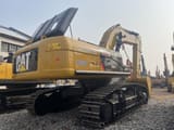 2023 Caterpillar 340DL crawler excavator, rear three-quarter view