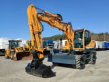 2014 Hyundai R140W-9 wheel excavator, side view
