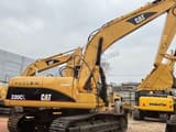 Caterpillar 320CL rupsgraafmachine uit 2018, zijaanzicht