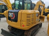 2022 Caterpillar 305.5E2 crawler excavator rear three-quarter view