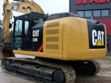 2012 Caterpillar 320E crawler excavator, rear three-quarter view