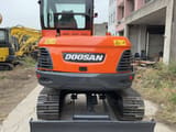 Doosan DX60-9C mini excavator, rear view