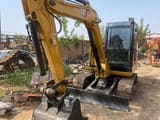 Caterpillar 306D mini excavator, front three-quarter view