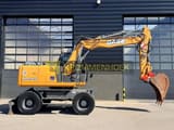2016 CASE WX148 wheel excavator, side view