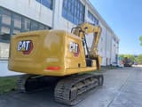 2018 Caterpillar 320GC mini excavator, rear three-quarter view