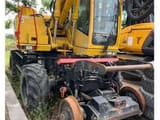2013 Atlas 1404 ZW wheel excavator rear three-quarter view