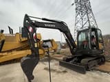 2023 Volvo EC60C mini excavator, side profile view