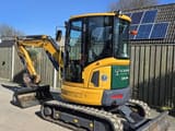 2023 XCMG XE35E mini excavator, three-quarter view