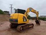 2023 Komatsu PC60-8 mini excavator, rear three-quarter view
