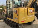 2026 Caterpillar 305.5E2 mini excavator rear three-quarter view