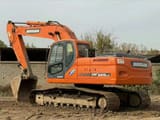 2022 Doosan DX225LC crawler excavator, side view