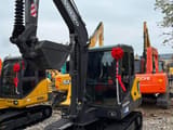2024 Volvo EC60D mini excavator, front three-quarter view
